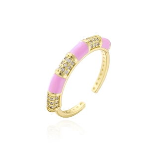 Macro detail of 18K gold-plated ring showing pink enamel and micro-set cubic zirconia