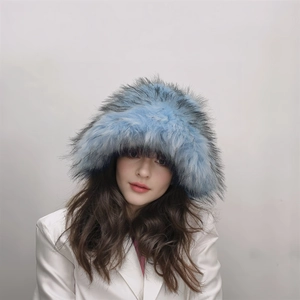Close-up of light blue faux fur hat showing thick punk style long plush texture