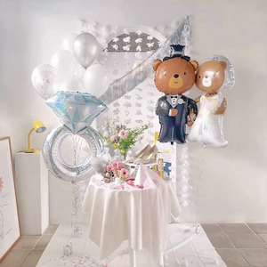 Detailed wedding balloon set featuring bride and groom bears with a large diamond ring