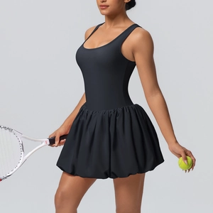 Detail of black tennis dress with a stylish bubble hem design and quick-dry fabric