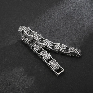 Retro stainless steel X-link chain bracelet with intricate floral engravings for men