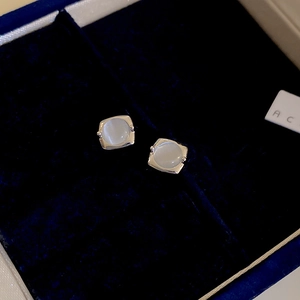 Minimalist square faux cat-eye stone earrings in silver frame on dark blue velvet