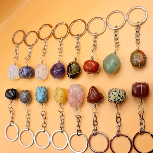 Set of 16 natural crystal stone keychains with wire-wrapped pendants in various colors