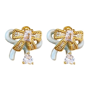 Silver needle bow stud earrings with light blue enamel and sparkling zircon accents