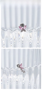 Detail view of silver butterfly stud earring featuring pink marquise zirconia stones