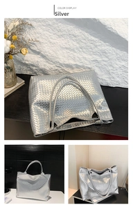 Detailed view of silver woven tote bag featuring large metallic faux leather squares
