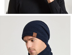 Detailed close-up of dark blue knitted hat and scarf set with diamond weave texture