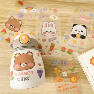 Cartoon bear thermal water bottle with waterproof PVC stickers on wood background