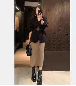 Elastic wide black waist belt styled with suit jacket and khaki knit skirt for women