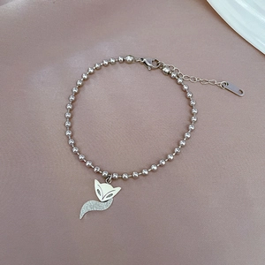 Polished silver titanium steel bead bracelet with a sparkling fox pendant for women