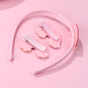 Pink glitter headband and cloud hair clips set for girls on a soft pink background