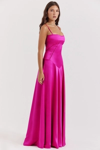 Detail of rose red satin dress featuring diagonal stitching and slim fit camisole design
