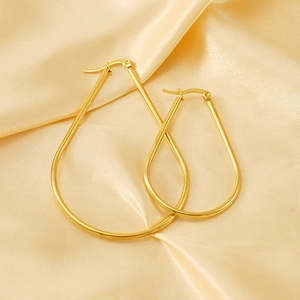 Minimalist gold teardrop earrings in polished stainless steel for a stylish classic look