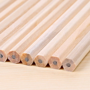 Hexagonal natural wood HB pencils for sketching and writing, close-up of graphite core