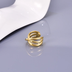 Detailed view of triple-layered cross design 18K gold-plated stainless steel ring