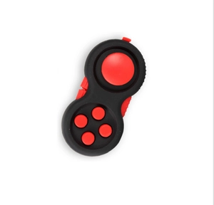 Top-down view of black and red stress relief fidget controller with silicone buttons