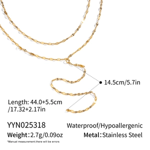 Detailed close-up of double-layered Y-shaped gold necklace in waterproof stainless steel