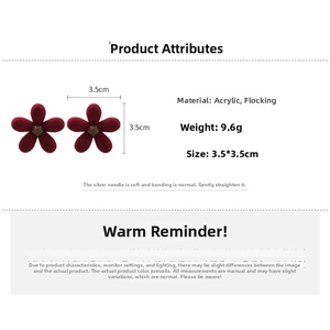 Detail of red flocked flower studs with silver needles and 3.5cm measurement