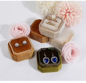 Octagonal velvet jewelry box in champagne, green, and beige for rings and earrings