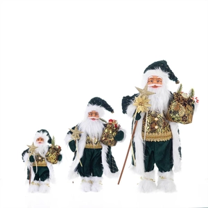 Three-piece Santa Claus figurine set in dark green and gold for Christmas decor