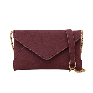 Elegant wine red matte envelope bag with V-flap design and golden chain shoulder strap