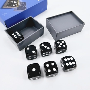 Black plastic dice set with seven pieces in a storage box for table games and magic tricks