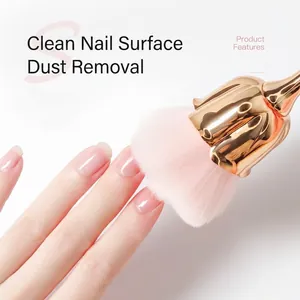 Rose-shaped nail dust brush with soft pink bristles and rose gold handle for manicure