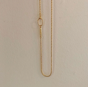 Golden olive bead necklace with minimalist oval link and engraved rectangular tag