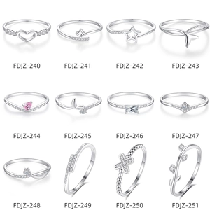 Collection of S925 sterling silver rings with heart, star and moon shapes on white background