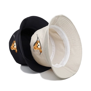 Unisex cotton bucket hat with cute teddy bear print, available in black and beige