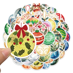 Vibrant Christmas ball doodle stickers set shown in hand for holiday decorations