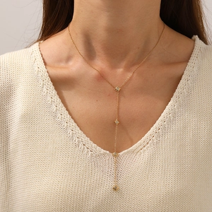 Gold plated stainless steel Y-shaped necklace featuring sparkling star pendants for women