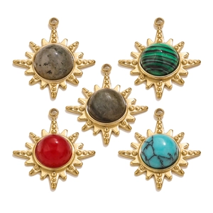Golden sunburst pendants with colorful natural stones and starburst engraving detail