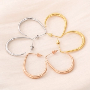 U-shaped stainless steel teardrop hoop earrings in gold silver and rose gold finishes