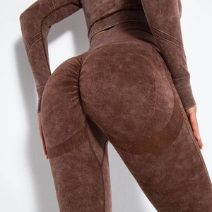 Detail of seamless acid wash yoga set showing breathable honeycomb texture and lifting effect