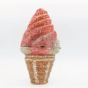 Detail of ice cream clutch bag showing pink and champagne crystals with metal clasp closure