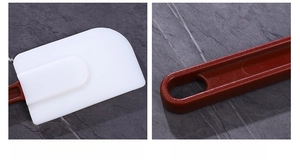 Detailed view of flexible silicone spatula head and red handle with convenient hanging hole