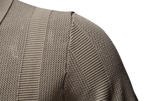 Close-up of the shoulder seam and textured knit pattern on this khaki striped polo shirt