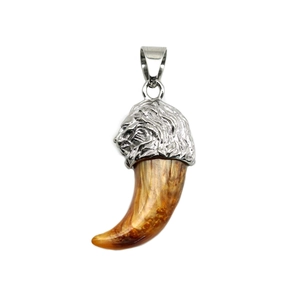 Gothic lion head pendant with resin amber wolf tooth on a polished silver metal bail