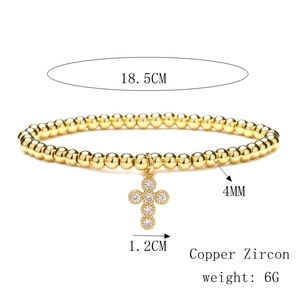 Detail of 4mm gold copper bead bracelet with zircon cross pendant and size specifications