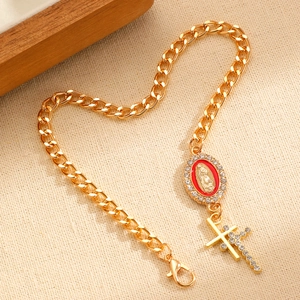 Bracelet chaîne gourmette dorée vintage avec médaillon de la Vierge et croix en cristal