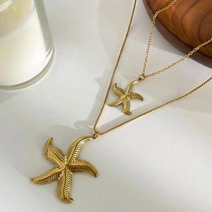 Layered 18k gold starfish pendants on o-chain and box chain necklaces for women