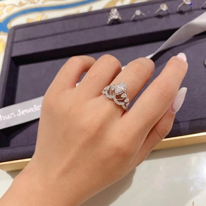 Luxurious pear-cut teardrop crown ring in 18K white gold plating with micro-pave diamonds
