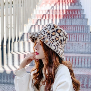 Close-up of thick leopard print faux fur texture on a warm winter bucket hat for women