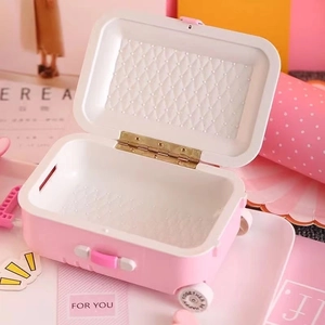 Pink mini suitcase organizer and gift box with diamond pattern lining in creative design