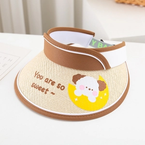 Detail of kids straw sun visor with cute cartoon dog and You are so sweet text