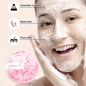 Pink facial sponge removing cosmetic residue, dead skin, and pore stains effectively