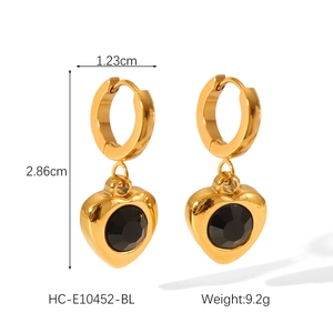 Detail shot of 18K gold plated heart earrings with black zircon and size dimensions
