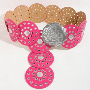 Detail of pink leather belt with silver carved round buckle and circular tiered charms