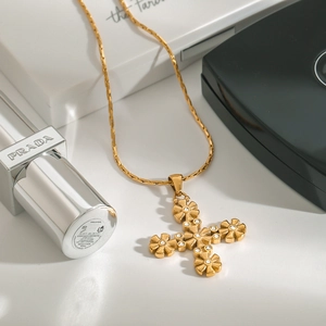 Elegant 18K gold-plated stainless steel cross necklace with floral diamond pavé detail